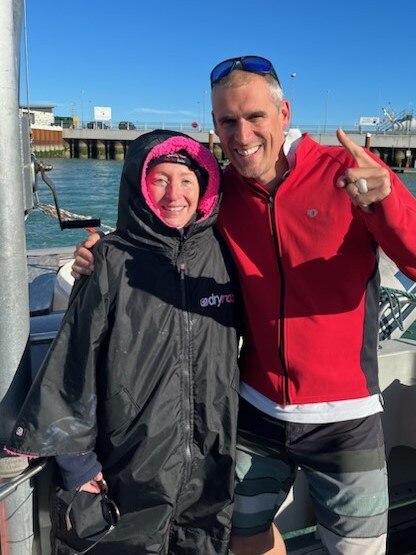 Townsville long-distance swimmer Elizabeth Denyer with her English swim coach, Tim Denyer, who is not related, after swimming across the world’s busiest seaway. Picture: Supplied