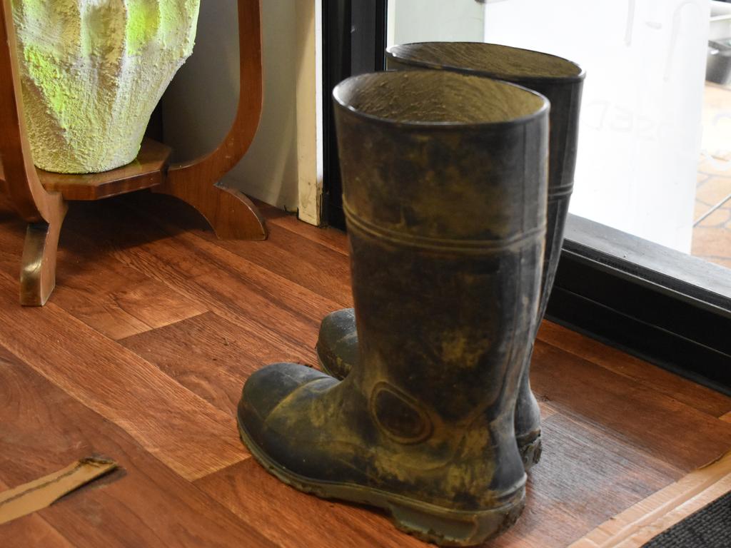 You know it's a country store at heart when a customer has taken their boots off at the door. Picture: Heidi Petith