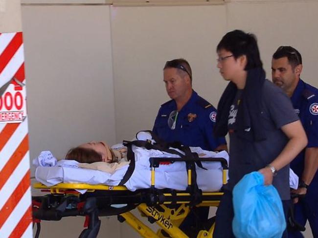 An injured passenger is taken to hospital in a neck brace. Picture: 9 News