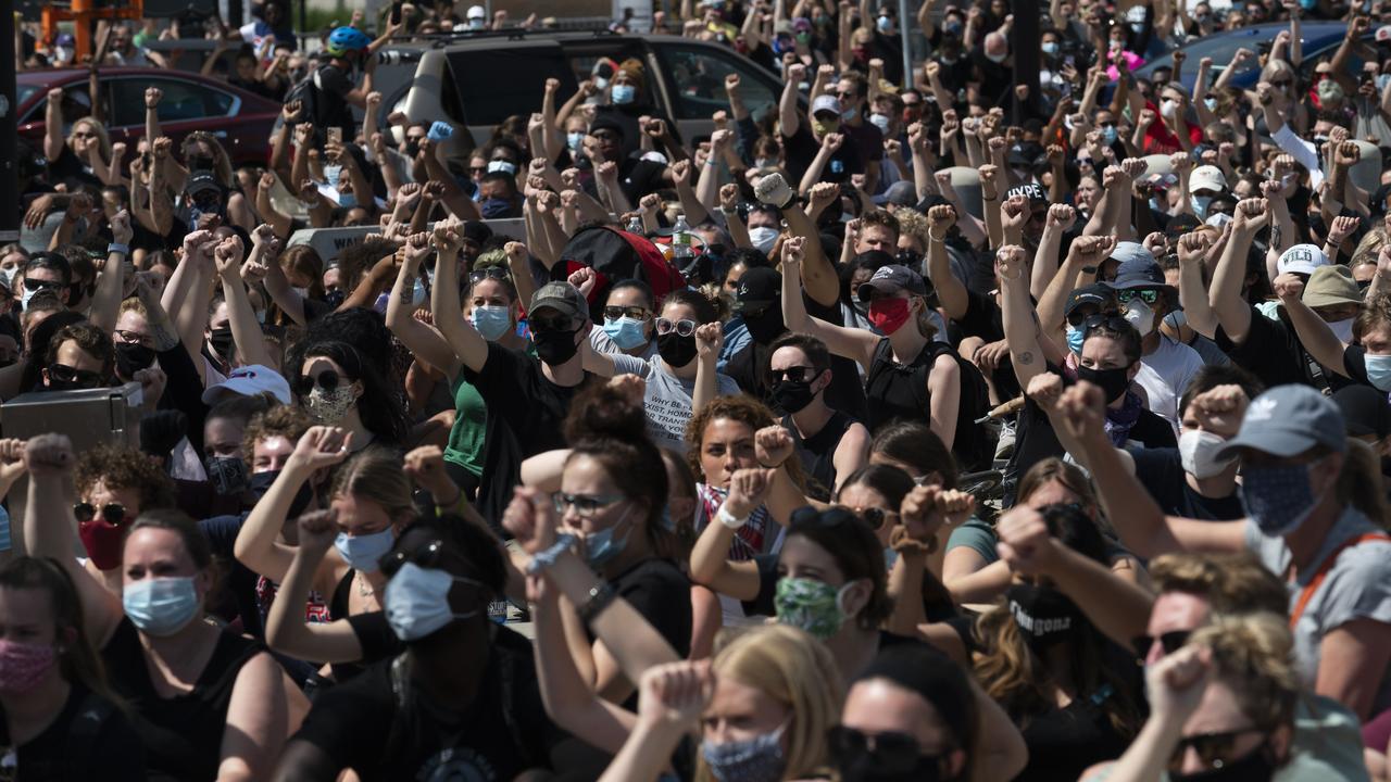 Some health experts and politicians are concerned large protests, such as in Minneapolis above, will lead to a surge in coronavirus cases. Picture: Stephen Maturen/Getty Images/AFP.