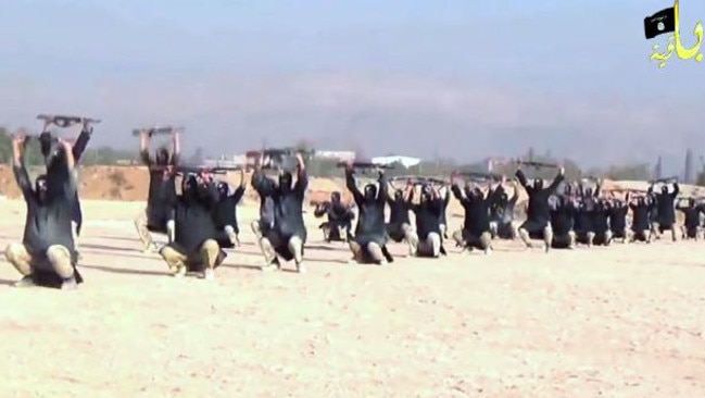 Push-ups ... Black masks and assault rifles gives these exercises an added edge.