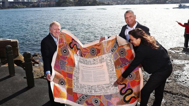 Rachel Perkins, former High Court judge Michael Kirby and Uphold and Recognise chairman Sean Gordon with the Uluru Statement at Mrs Macquarie's Chair in Sydney. Picture: John Feder/The Australian