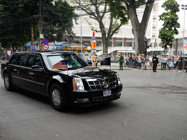 A motorcade, transporting US President Donald Trump, leaves the Sofitel Legend Metropole hotel following the second US-North Korea summit in Hanoi. Picture: AFP