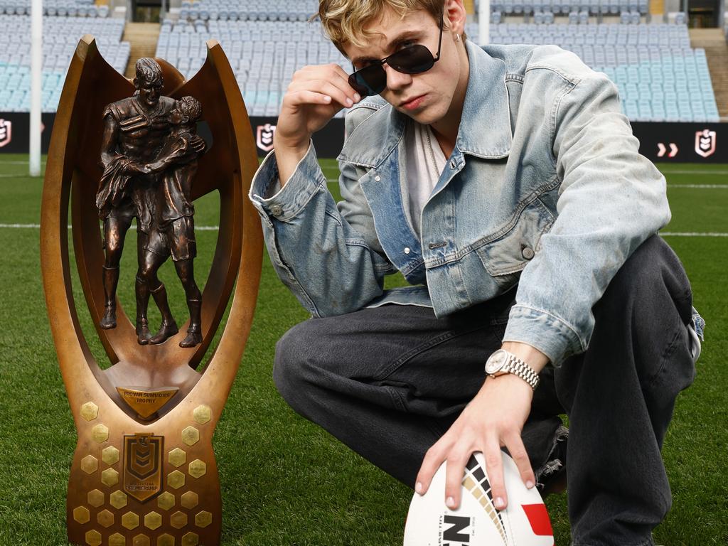 The Kid Laroi with the Provan-Summons Trophy and match ball ahead of rehearsal for his NRL grand final performance at Accor Stadium in Homebush. Picture: Jonathan Ng