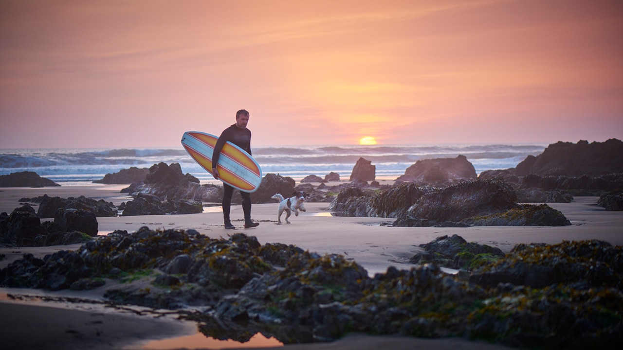 <h2>GO SURFING IN CORNWALL</h2><p><a href="https://www.visitcornwall.com/" target="_blank" rel="noopener">Cornwall</a> has a thriving surf scene, including its popular <a href="https://boardmasters.com/" target="_blank" rel="noopener">Boardmasters Festival</a> in Newquay, in August. The UK&rsquo;s most popular summer destination is full of picturesque villages, beautiful beaches, gourmet restaurants and fabulous hotels. Popular surfing spots include Fistral Beach (Newquay), Polzeath Beach (near Padstow), Porthtowan Beach and Praa Sands Beach.</p><p><strong>Where to stay:</strong> Rick Stein&rsquo;s <a href="https://rickstein.com/restaurants/the-seafood-restaurant/" target="_blank" rel="noopener">The Seafood Restaurant</a> has 16 rooms, in the centre of Padstow.</p><p><strong>Top tip:</strong> Getting to Cornwall by car can be a slow process. Alternatively, take the train or the <a href="https://www.gwr.com/travelling-with-us/night-riviera-sleeper" target="_blank" rel="noopener">Night Riviera Sleeper</a> from London. You can also fly to Newquay.&nbsp;</p>