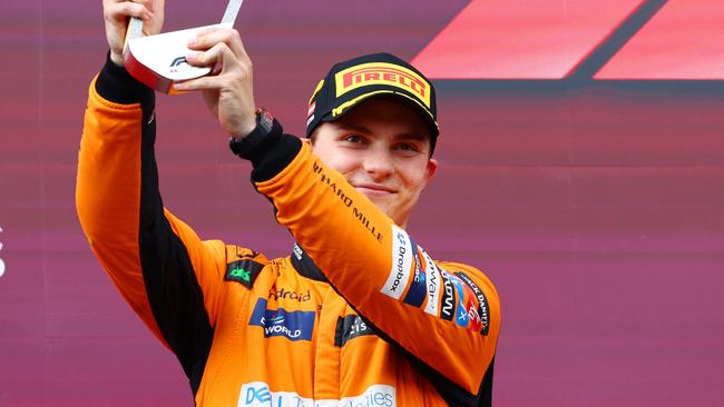 SPIELBERG, AUSTRIA - JUNE 30: Second placed Oscar Piastri of Australia and McLaren celebrates on the podium during the F1 Grand Prix of Austria at Red Bull Ring on June 30, 2024 in Spielberg, Austria. (Photo by Clive Rose/Getty Images)