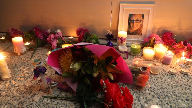 Flowers and candles placed during a vigil in front of the residence of Teresa Bradford's in Matas Drive where she died in a murder-suicide, Pimpama, Gold Coast. Photo: Regi Varghese