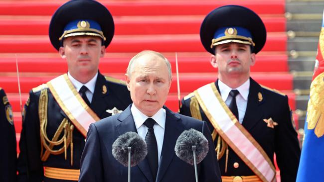 Vladimir Putin addresses troops gathered in the grounds of the Kremlin. Picture: AFP.