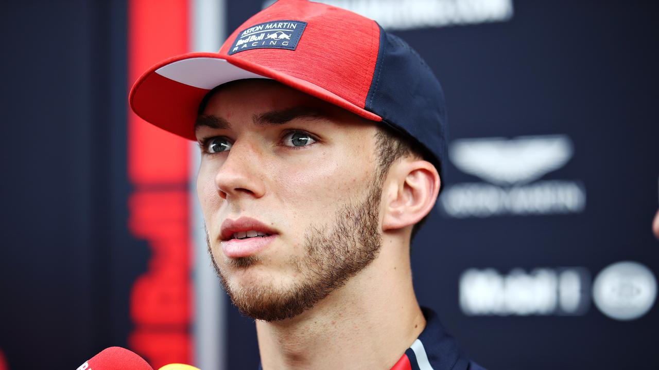 SPIELBERG, AUSTRIA - JUNE 27: Pierre Gasly of France and Red Bull Racing talks to the media in the Paddock during previews ahead of the F1 Grand Prix of Austria at Red Bull Ring on June 27, 2019 in Spielberg, Austria. (Photo by Bryn Lennon/Getty Images)