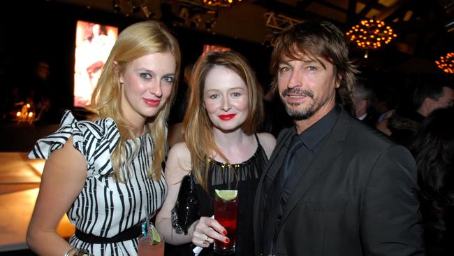 Gracie Otto, left, in 2008 with sister Miranda and Peter O'Brien. Picture: Richard Dobson