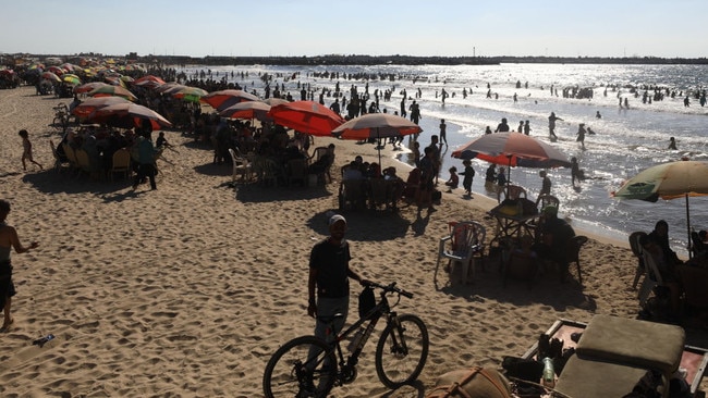 Palestinians try to cool off by spending time near the sea during hot weather as Israeli attacks continued in Gaza City in August 2024. Picture: Dawoud Abo Alkas/Anadolu via Getty Images