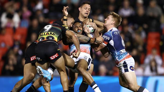 Hamiso Tabuai-Fidow is crunched by the Panthers’ defence. Picture: Matt Blyth/Getty Images