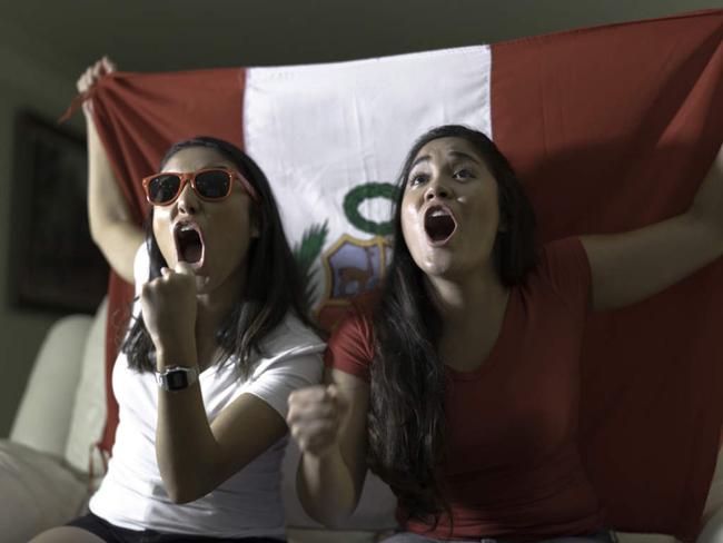 Peruvian Fan Celebrating at Home