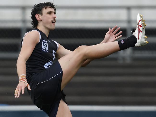 MELBOURNE, AUSTRALIA - MAY 06: Liam McMahon of Carlton kicks a goal during the round seven VFL match between Carlton Blues and Brisbane Lions at Ikon Park on May 06, 2023 in Melbourne, Australia. (Photo by Darrian Traynor/AFL Photos)