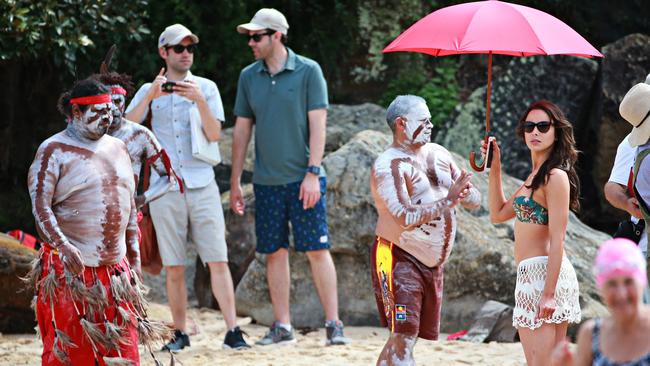 Ashleigh Brewer keeps the sun off on set. Picture: Adam Yip/ The Manly Daily