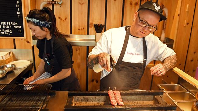 Chef Adam Liston prepares the A5 grade Japanese wagyu with egg yolk and tare sauce at Shobosho. Picture: Tom Huntley