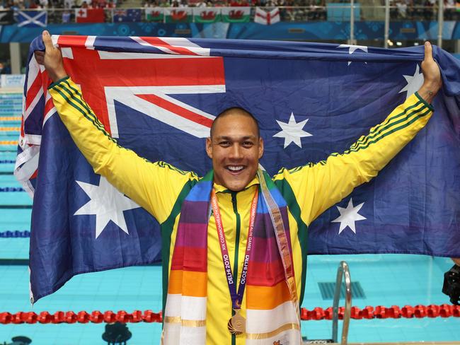 Geoff Huegill wins gold at the Comm Games 2010