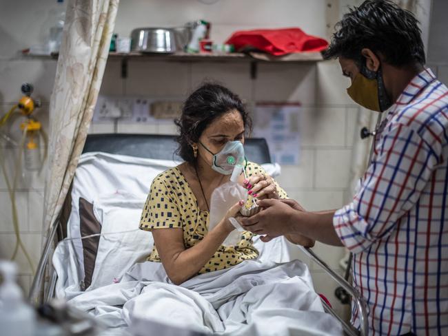 Medical staff attend to COVID-19 patients in the emergency ward at the Holy Family hospital in New Delhi, India. Picture: Getty Images