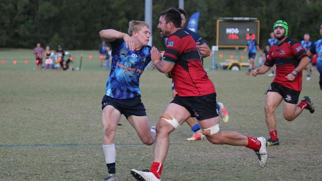 Gold Coast District Rugby Union (GCDRU) Grand Final 2021. Griffith Uni Colleges Knights v Helensvale Hogs at Rugby Lane, Helensvale on 18 September 2021. Seb Gallagher breaks the line before an impressive try-saving tackle from Sean Howlett. Pic Mike Batterham