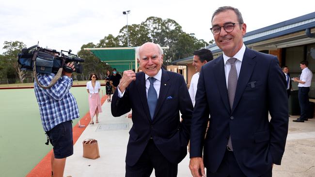 Marshall with former Prime Minister John Howard visits the Modbury bowls club in the last week of the South Australian election campaign. Picture: NCA NewsWire / Kelly Barnes