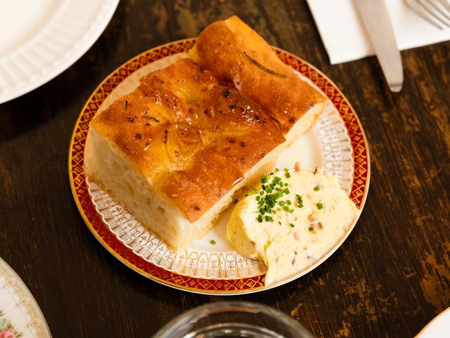 Focaccia smothered in onion butter is always a great idea. Picture: Andrew Clarke