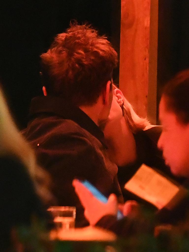 Gigi Hadid plants a kiss on Bradley Cooper during PDA-packed date night ...