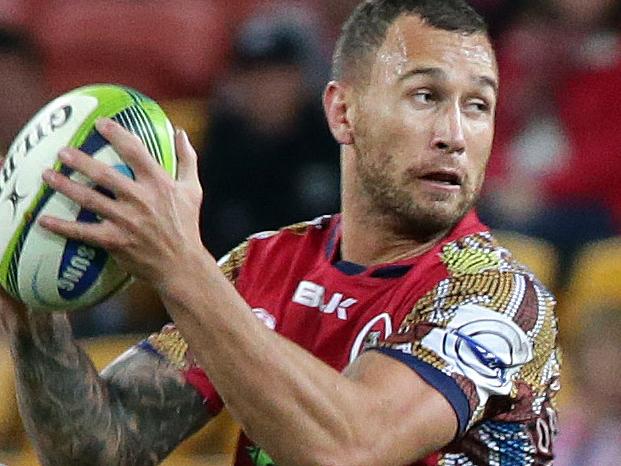 Quade Cooper & Will Genia of the Reds during the Super Rugby match between Queensland Reds and Chiefs, Suncorp Stadium, Brisbane. Photographer: Liam Kidston.