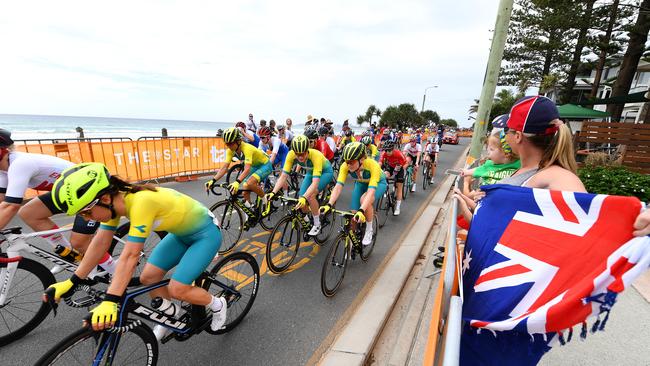 The peloton is seen during the women's cycling road race along Currumbin beach on day ten of the XXI Commonwealth Games on the Gold Coast, Australia, Saturday, April 14, 2018. (AAP Image/Dan Peled)