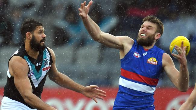 Jackson Trengove made life difficult for Paddy Ryder in the very wet conditions.