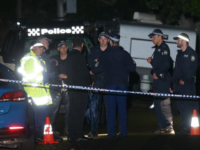 Crime scene ... Police in Larkhall Avenue, Earlwood last night. Picture: Bill Hearne