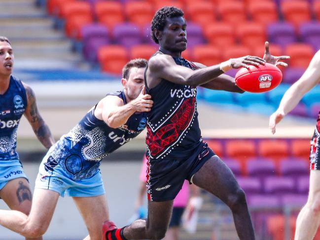 Tiwi Bombers young gun Karlson Kantilla in action during the 2023/24 NTFL season. Picture: Celina Whan