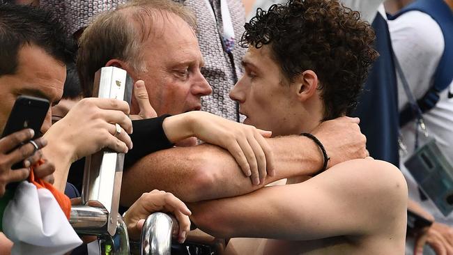 Well done, son! French star Benjamin Pavard gets his dad’s approval. Picture: AFP.