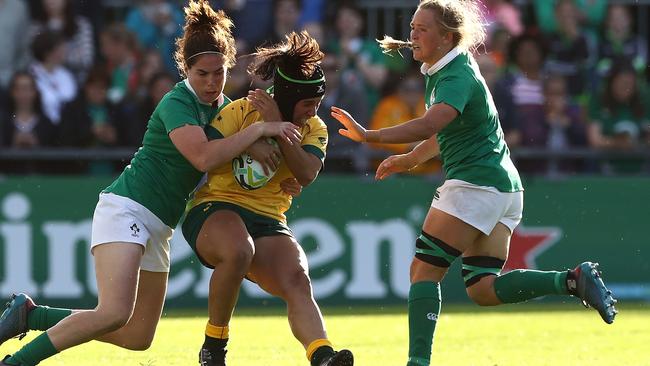 Cheyenne Campbell of Australia is tackled by Nora Stapleton of Ireland. Pic: David Rogers/Getty Images