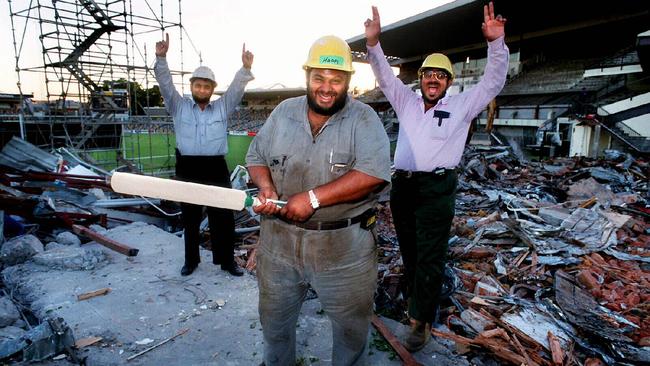 The Deen brothers’ greatest hit ... hard at work demolishing the grandstands of the Gabba in 2000. Picture: David Sproule