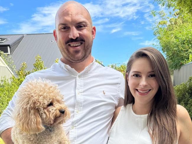 Stacey Lee has announced she is is pregnant. Picture with her husband Ben Millar and their dog Murray. Picture: Supplied