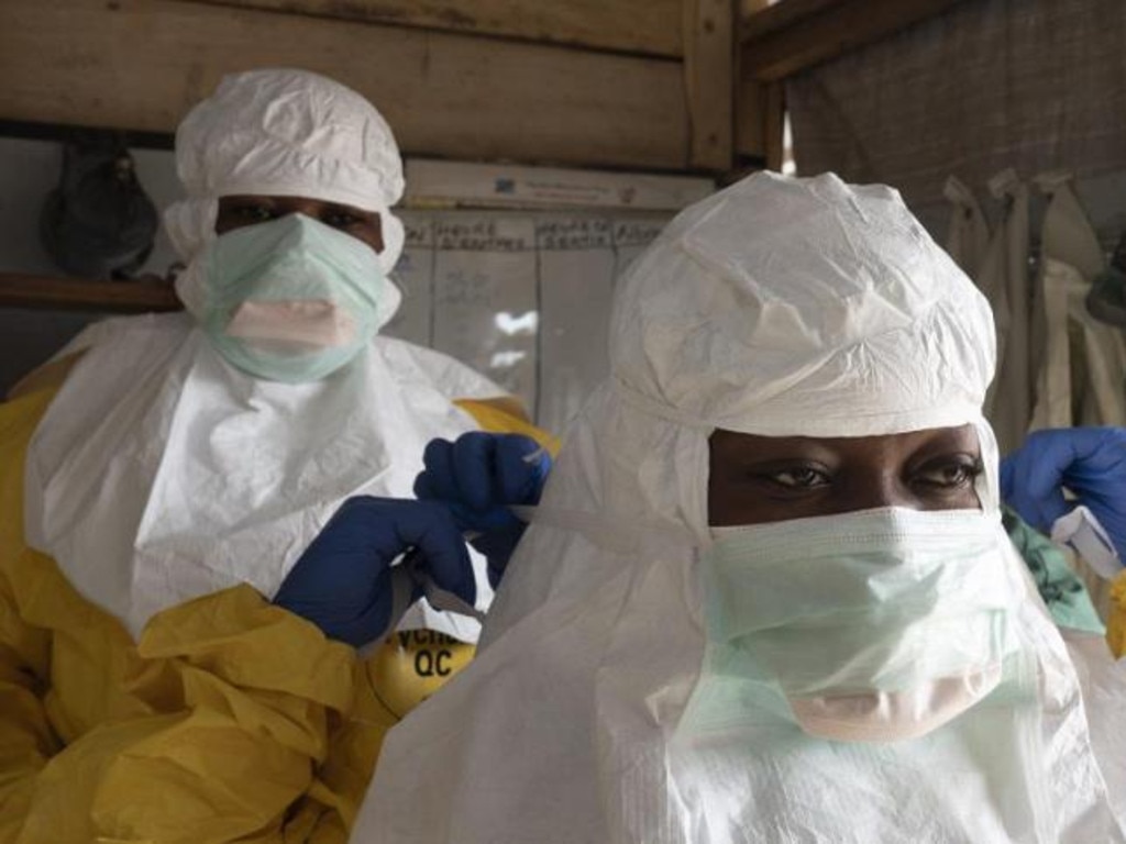 Health workers use gloves and protective clothing when treating Marburg patients.