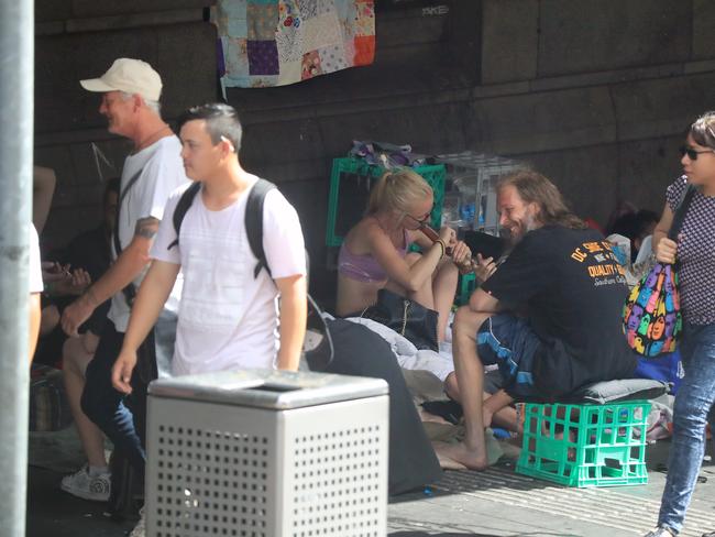 A girl smokes a bong in full view of the public. Picture: Alex Coppel