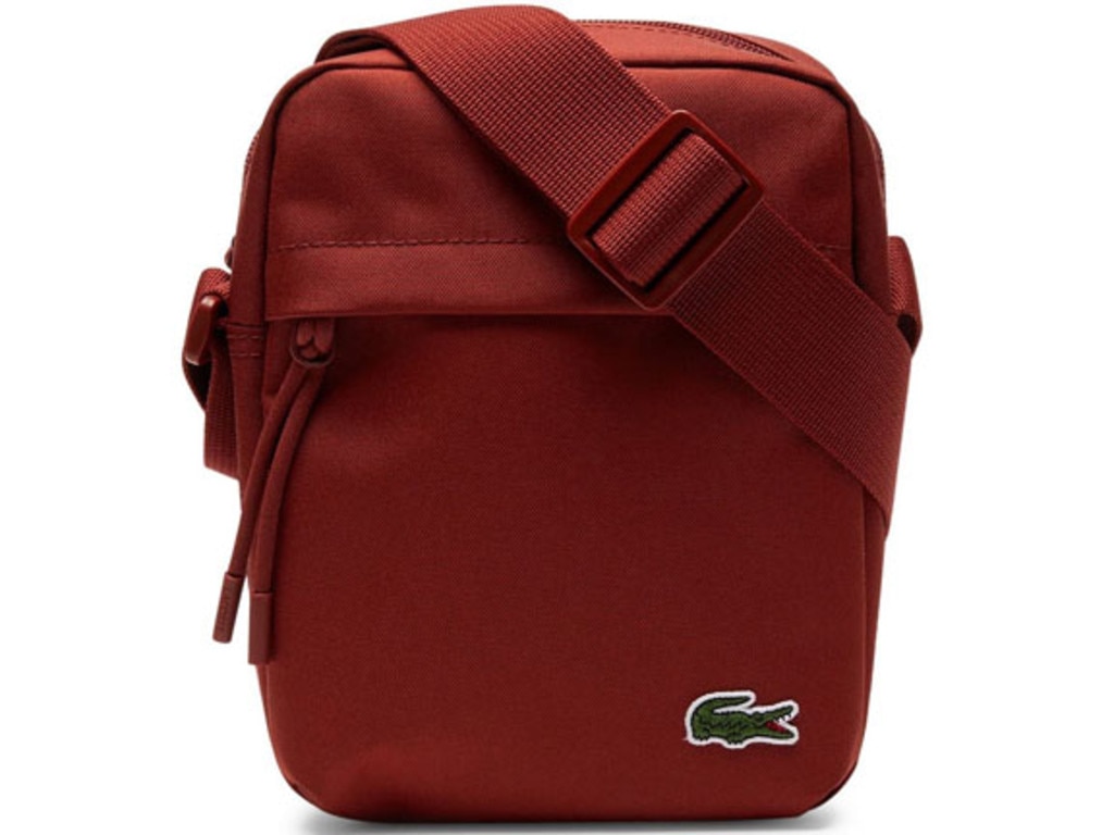 <p><b>LACOSTE &mdash; NEOCROC VERTICAL CAMERA BAG, $99.95</b> Hit the streets in <a href="https://www.davidjones.com/BAGS-AND-ACCESSORIES/MENS-BAGS/SATCHELS-AND-MESSENGER-BAGS/22648041/NEOCROC-VERTICAL-CAMERA-BAG.HTML" target="_blank" rel="noopener">this practical camera bag</a> that&rsquo;ll easily hold all your necessities for a successful day out. An exterior zip pocket is great for your phone, passport or wallet. This one&rsquo;s lightweight, practical and a winner in the style stakes.</p>