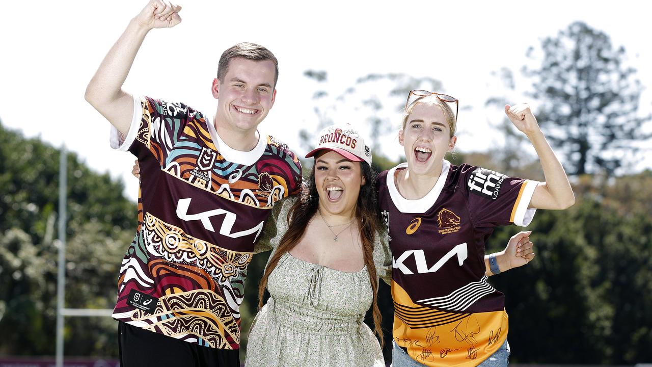 Footy fans looking to stay in Brisbane might have to cough up for it. Pictured are Broncos fans Braeden Morris, Calaya Rillie and Chelsea Morris after the team’s training in Brisbane on Monday. (Image/Josh Woning)