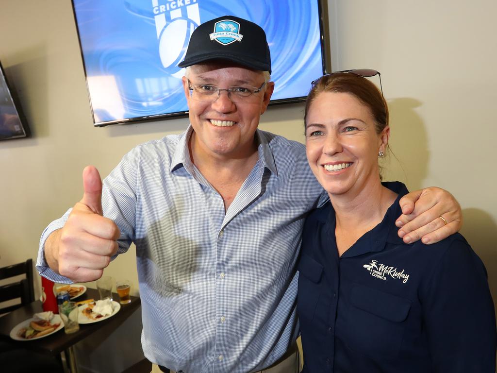 Prime Minister Scott Morrison enjoys a beer with locals at Gannons Pub in flood-ravaged Julia Creek. Picture: Nigel Hallett 