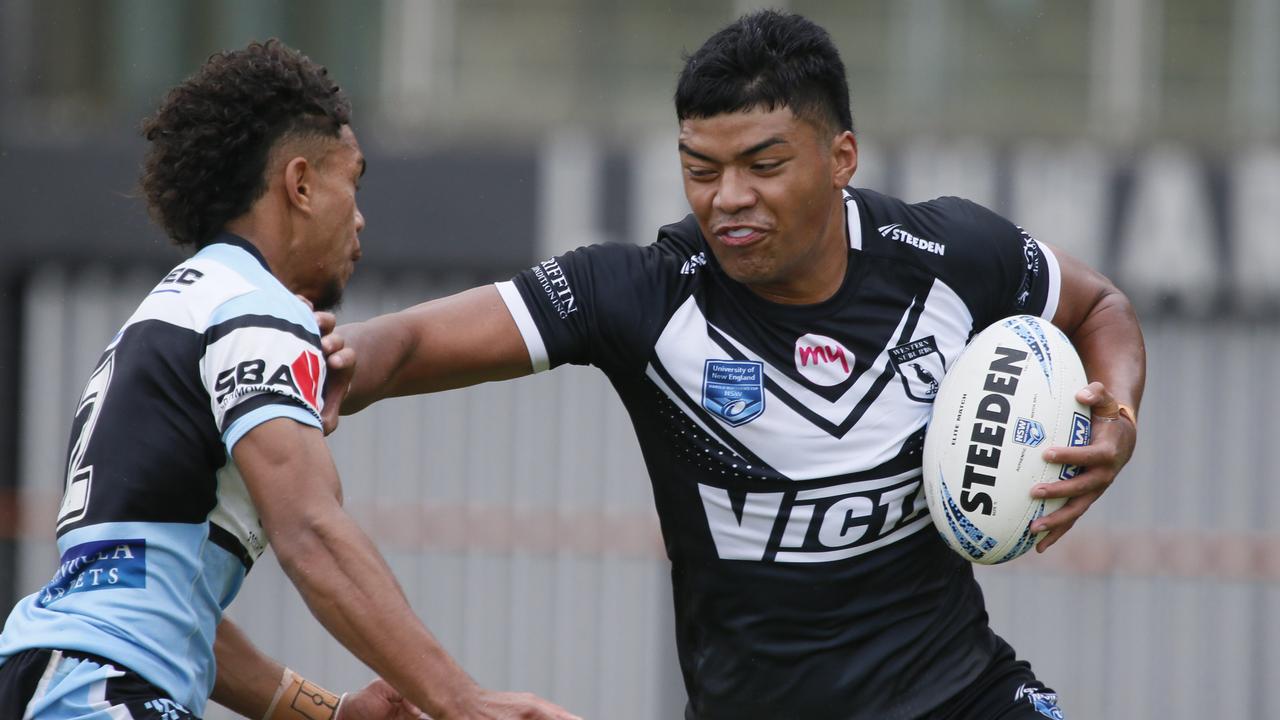 Year 11 student Heamasi Makasini, 17, pictured right at the NSWRL Junior Reps finals at Leichhardt Oval on 20 April 20, has signed a deal worth $1 million. Picture: Warren Gannon