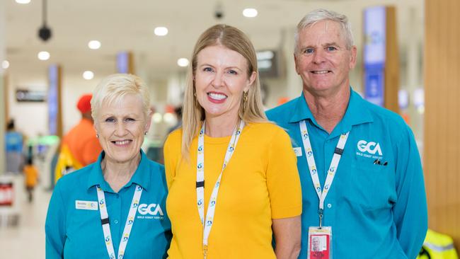 Gold Coast Airport Chief Operating Officer Marion Charlton with volunteer Ambassadors Annette and Jim. Pic: Gold Coast Airport