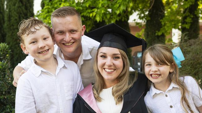 Bachelor of Education (Secondary) with distinction graduate Rebecca Boisen celebrates with family (from left) Archer, Alex and Evie Boisen at a UniSQ graduation ceremony at The Empire, Tuesday, October 29, 2024. Picture: Kevin Farmer