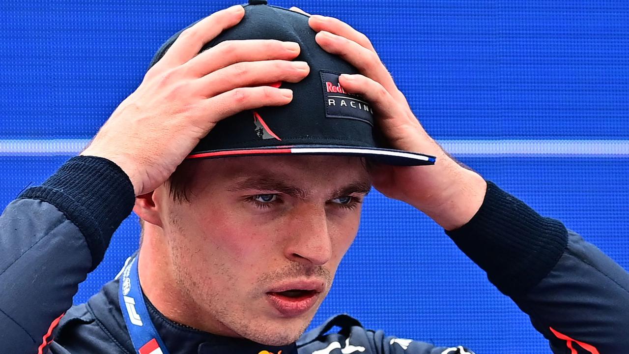 Red Bull Racing's Dutch driver Max Verstappen reacts after winning pole position in the sprint race at the Autodromo Internazionale Enzo e Dino Ferrari race track in Imola, Italy, on April 23, 2022, ahead of the Formula One Emilia Romagna Grand Prix. (Photo by ANDREJ ISAKOVIC / AFP)
