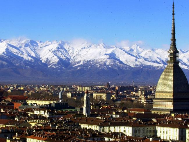 A view of Turin, Italy, with the main city landmark, the Mole Antonelliana, (R) and the Alps. Picture: AP