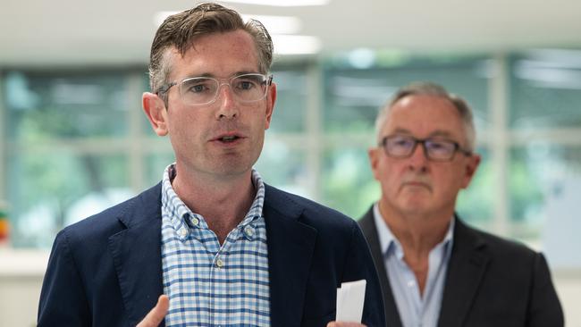 Premier Dominic Perrottet, here with Health Minister Brad Hazzard, says he is working hard to ease pressure on the NSW health system. Picture: Julian Andrews