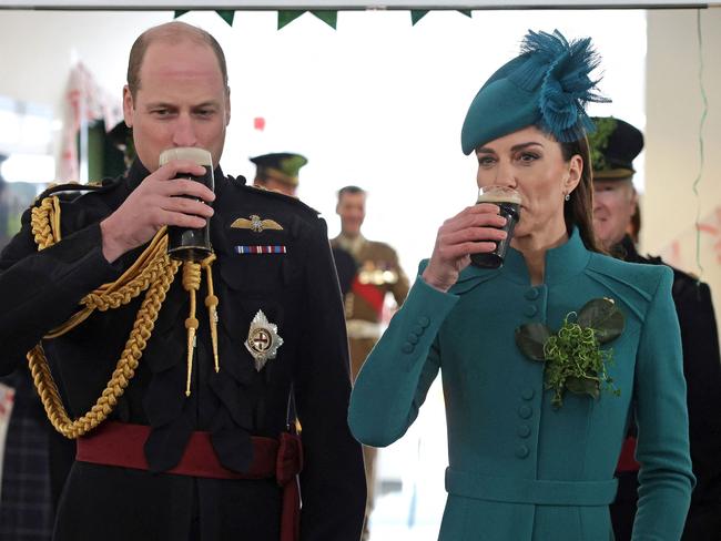 Princess Catherine put $4000 behind the bar for the Irish Guards. Picture: AFP