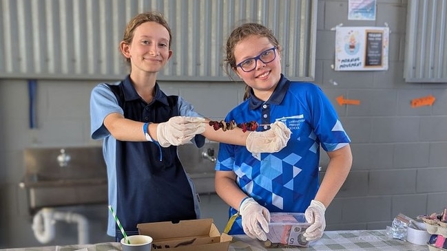 Rota and Liora from Cafe Dipped showcasing their delicious sweets.