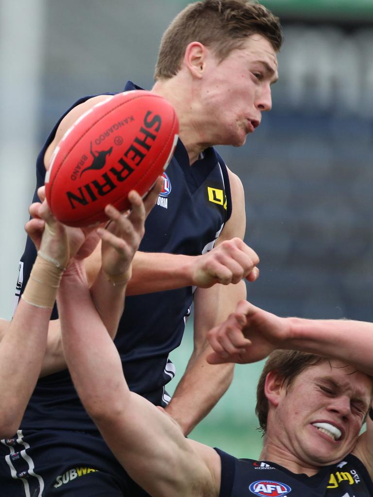 Devon Smith and Taylor Adams crashing packs in the under 18s.