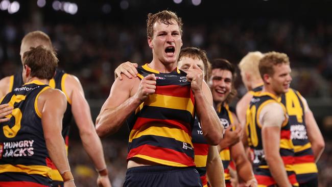 Jordan Dawson celebrates after winning the game with a goal after the siren during the 2022 AFL Round 03 Showdown. Picture: Sarah Reed